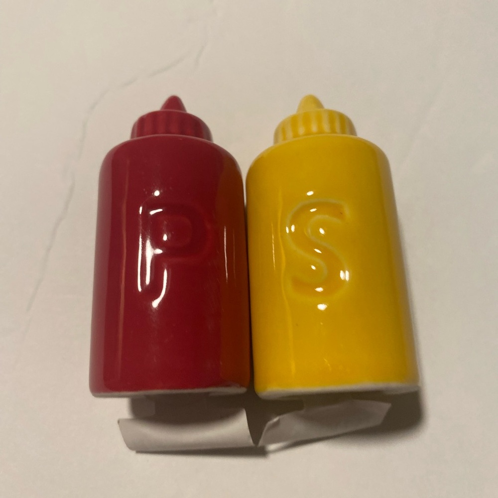 Red and Yellow Condiment Shakers